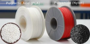 Material Forms Visualized: White PLA Pellets and Spool, Black Nylon Pellets and Spool on Grey Workbench