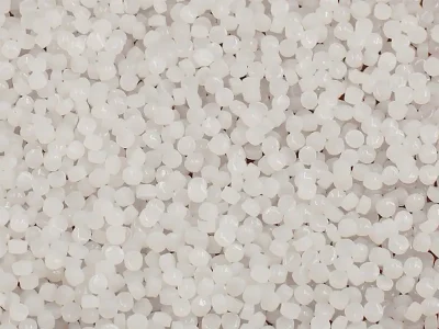 Polyethylene (PE) pellets in spherical, oblate, or short columnar shapes, in milky-white, translucent, or waxy-white colors.
